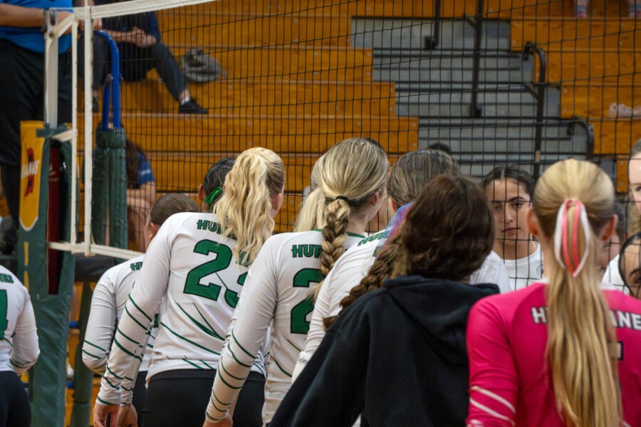 a group of young women standing next to each other
