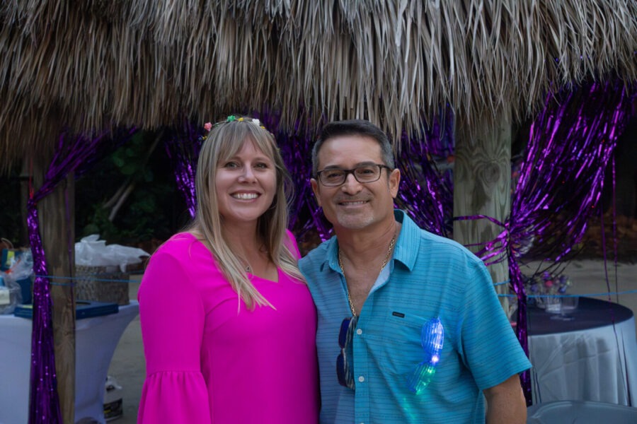 a man and a woman standing next to each other