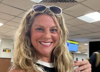 MARATHON NEIGHBOR OF THE WEEK: DONNA JEAN STEINBACH a woman wearing sunglasses and a black top