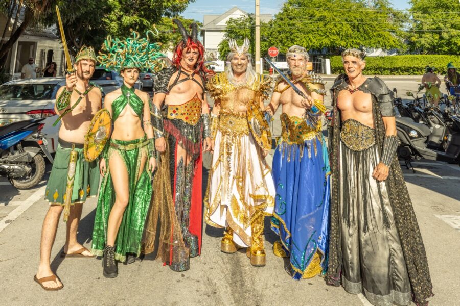 a group of people that are standing in the street