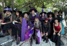 KIDS GET SWEETS AND SCARES AT CRANE POINT’S WITCHES IN THE HAMMOCK a group of people dressed up in halloween costumes