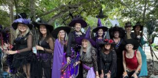 a group of people dressed up in halloween costumes