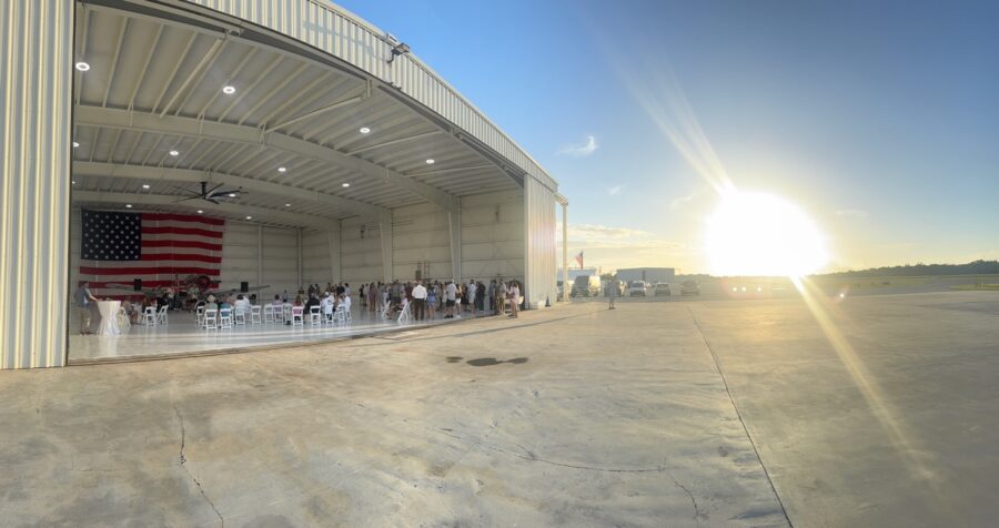 a group of people standing outside of a building