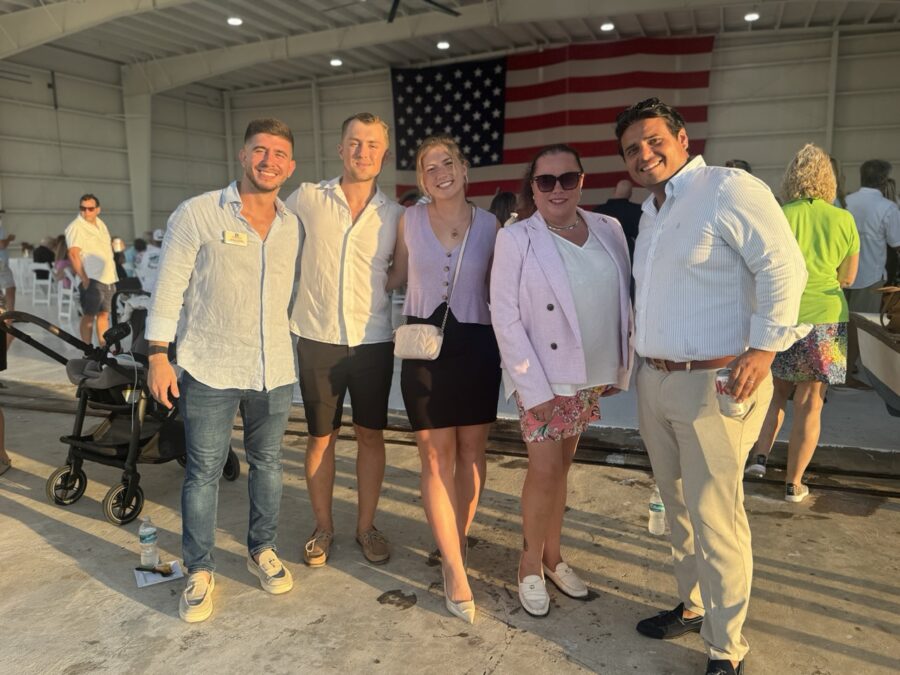 a group of people standing next to each other