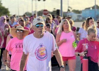 a group of people walking down a street