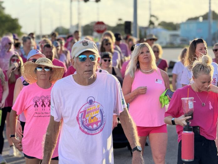 IMG_7093 Large a group of people walking down a street