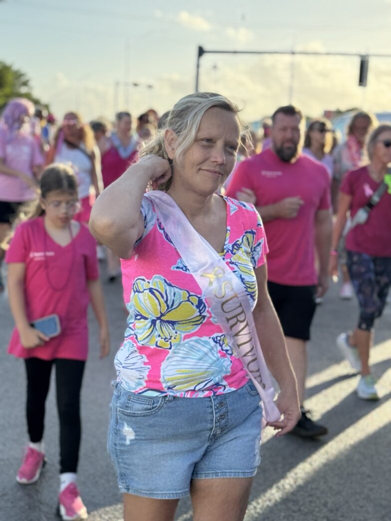 a group of people walking down a street