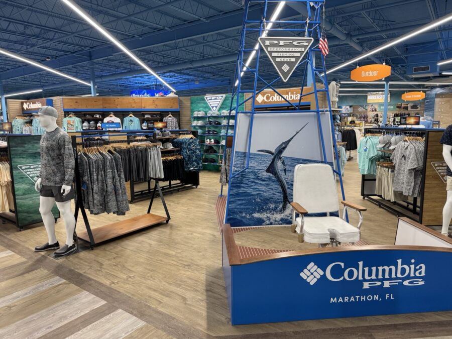 a clothing store with mannequins and clothing on display