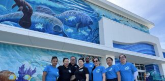 a group of people standing in front of a building