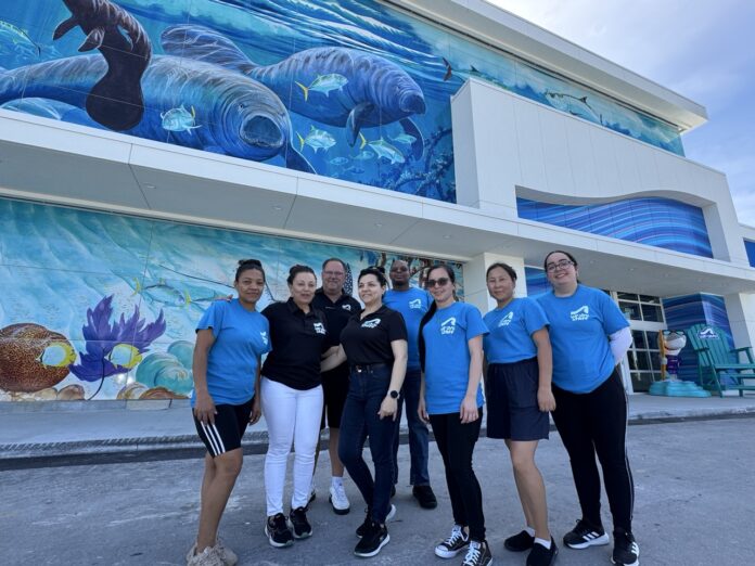 a group of people standing in front of a building