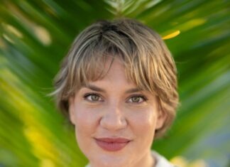 SARAH COMPTON CHALLENGES KEY WEST COMMISSIONER LISSETTE CAREY a woman with short hair wearing a white shirt