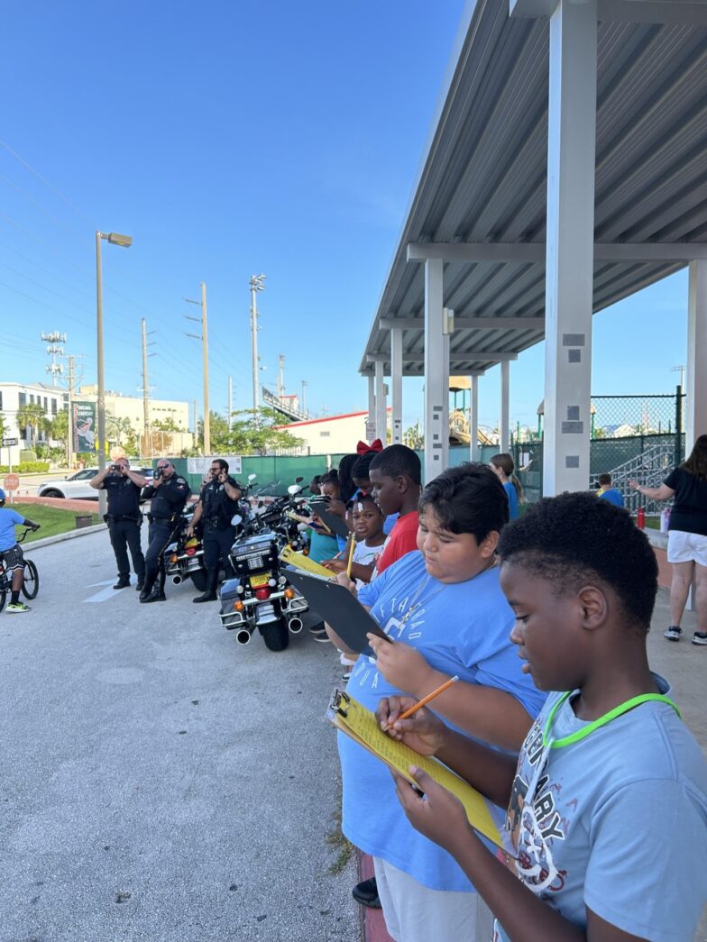 a group of people standing next to each other