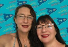 a couple of women standing next to each other