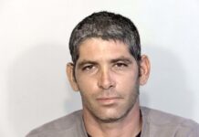 SUMMERLAND KEY MAN GETS LENGTHY PRISON SENTENCE FOLLOWING COCAINE TRAFFICKING CONVICTION  a man in a gray shirt is looking at the camera