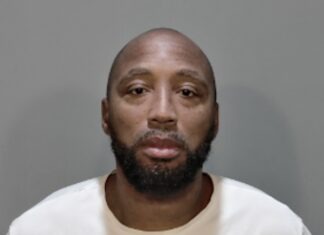 KEY WEST DRUG DEALER GETS PROBATION REVOKED a mug shot of a man in a white shirt