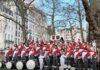 a group of men and women in red and white outfits