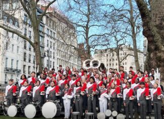 KEY WEST HIGH SCHOOL BAND RAISES MONEY FOR ROME TRIP a group of men and women in red and white outfits