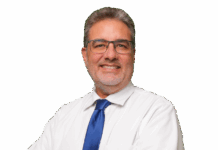a man in a white shirt and blue tie