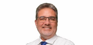 a man in a white shirt and blue tie