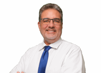 COMMISSIONER SAM KAUFMAN ENTERS KEY WEST MAYOR’S RACE a man in a white shirt and blue tie