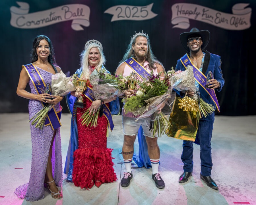 a group of people standing on top of a stage