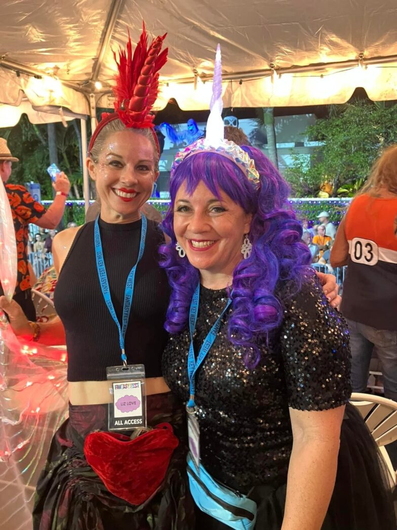 a couple of women standing next to each other