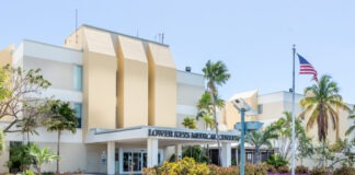 a large building with a flag on top of it