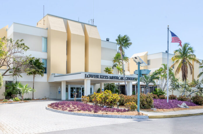 a large building with a flag on top of it