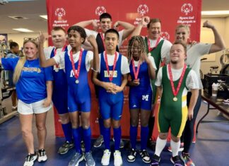 SPECIAL OLYMPICS ATHLETES DELIVER INCLUSIVE WINS FOR MONROE COUNTY a group of young people standing next to each other