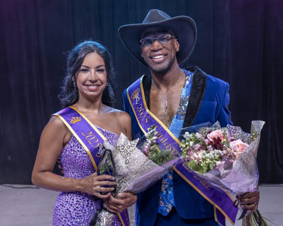 a couple of people standing next to each other