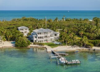 BARSTOOL SPORTS’ PORTNOY PURCHASES KEYS PROPERTY FOR A RECORD-SETTING $27.7 MILLION an aerial view of a home on the water