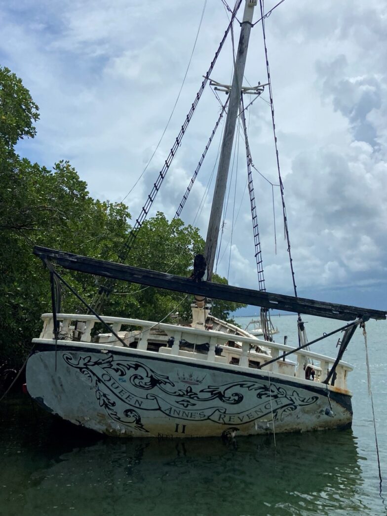a sailboat that is sitting in the water