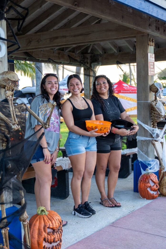a group of women standing next to each other