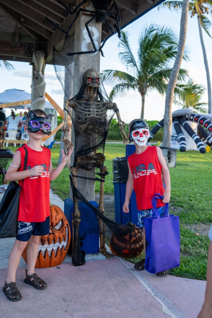 a group of children wearing halloween costumes