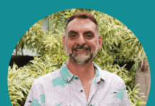 a man with a beard wearing a shirt
