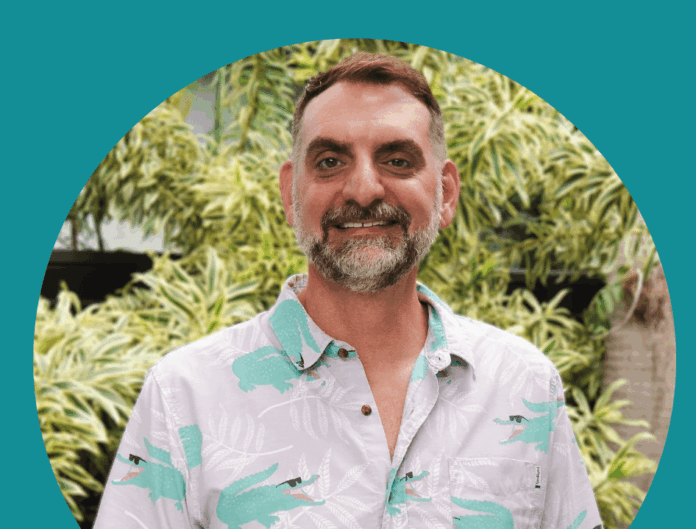 CHRIS MASSICOTTE CANDIDATE a man with a beard wearing a shirt