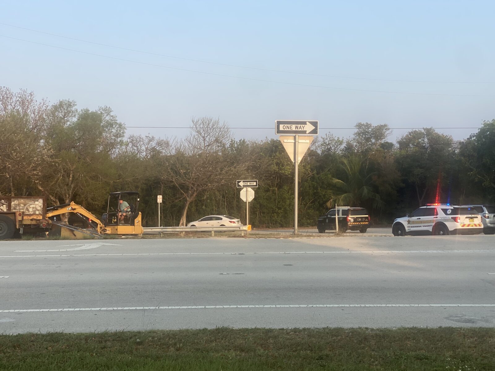 a couple of cars that are sitting in the street