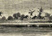 a black and white drawing of a village