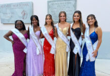 a group of women standing next to each other