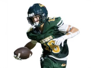 ATHLETE OF THE WEEK: JOHN OUGHTON a man in a football uniform holding a football