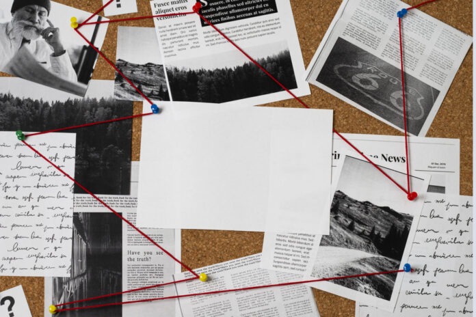 truth-concept-composition-detective-desk a bulletin board covered in lots of papers