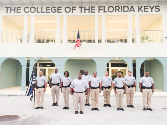 Crossover 37 a group of men standing in front of a building