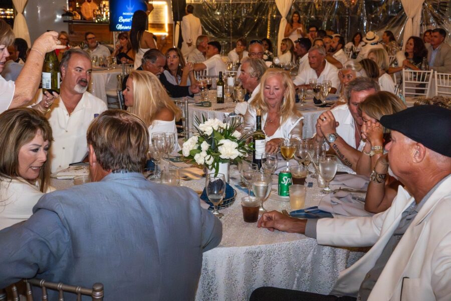 a group of people sitting around a table