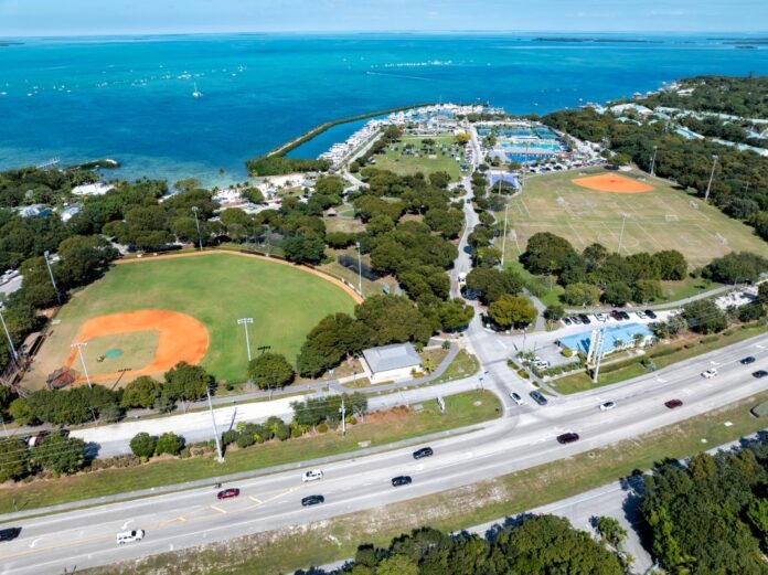 an aerial view of a baseball field near the ocean