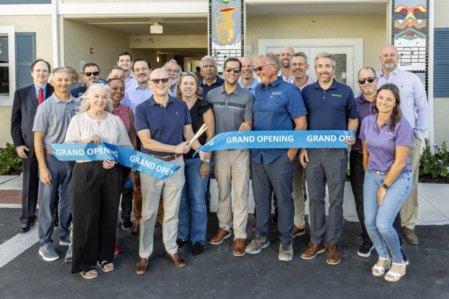 a group of people standing in front of a building