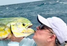 FLORIDA KEYS FISH REPORT: ANGLERS REEL IN 150 FISH DURING ‘LADIES, LET’S GO FISHING!’ TOURNAMENT a man on a boat holding a large fish