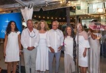 a group of people standing next to each other