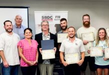 a group of people standing next to each other