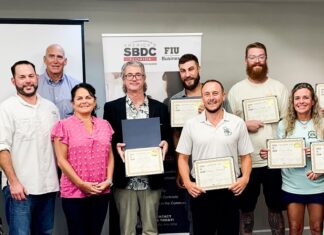 a group of people standing next to each other