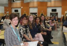 TAKE STOCK IN CHILDREN INKS 84 TO NEW SCHOLARSHIP CONTRACTS a group of women sitting next to each other